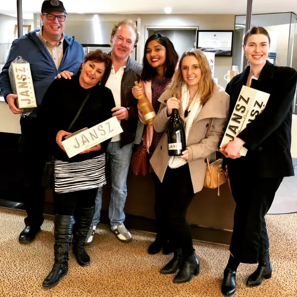 a group of people posing for a photo