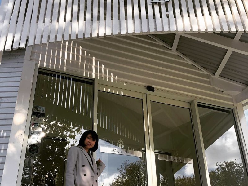 a man standing in front of a building
