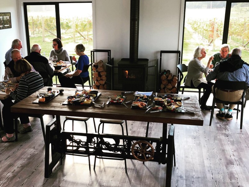 a group of people sitting at a table