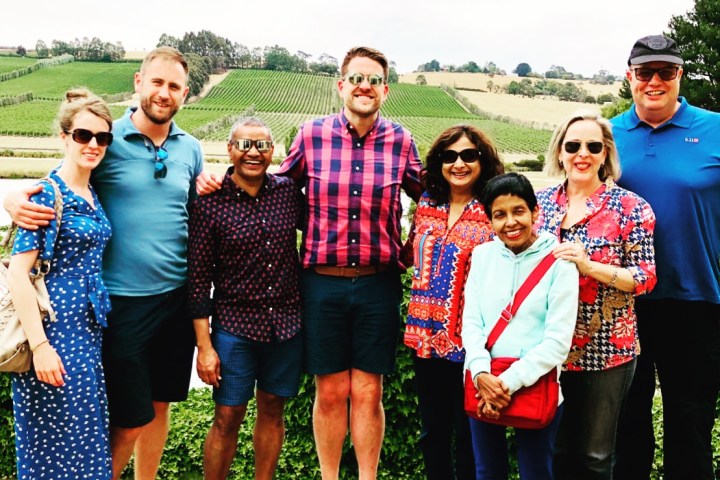 a group of people posing for a photo