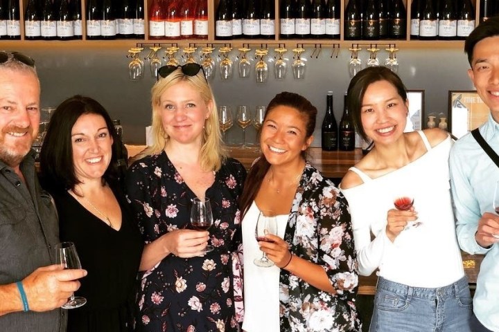 a group of people posing for a photo