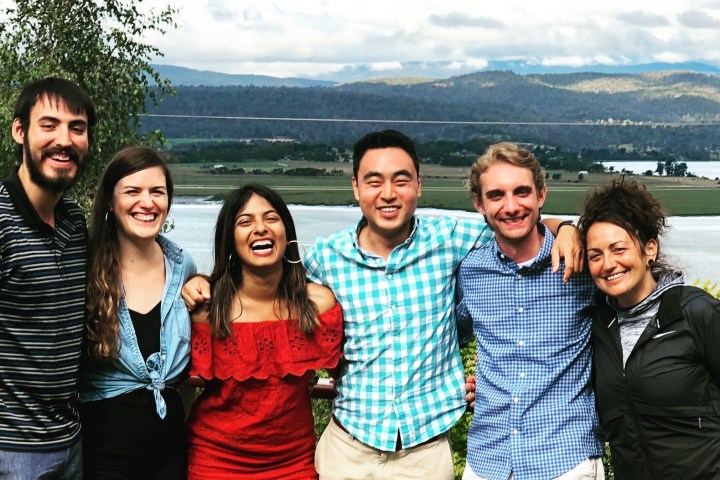 a group of people posing for the camera