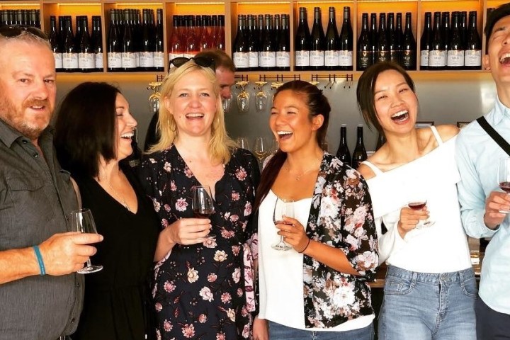 a group of people posing for the camera