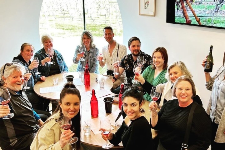 a group of people posing for a photo