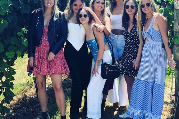 a group of people posing for a photo